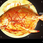 Marinated golden pomfret